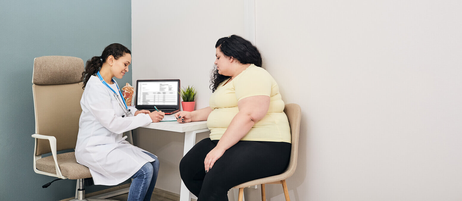 Woman visits at weight loss clinic for treatment