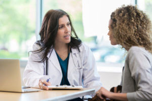 harmone doctor discussing about testosterone shots with her patient