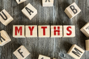 Myths inscribed on wooden cubes to illustrate the myths surrounding longevity extension.
